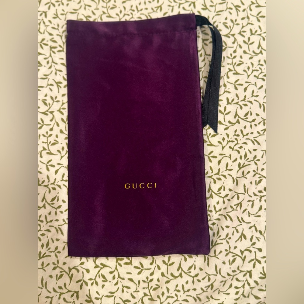 Authentic Gucci sunglasses pouch.